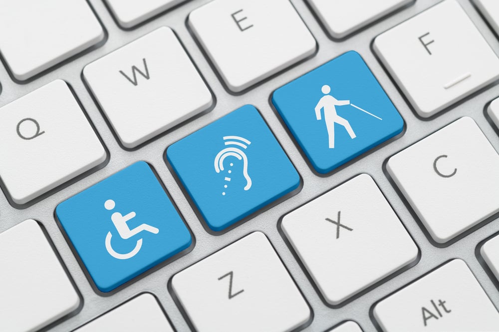 Three accessibility icon on computer keyboard
